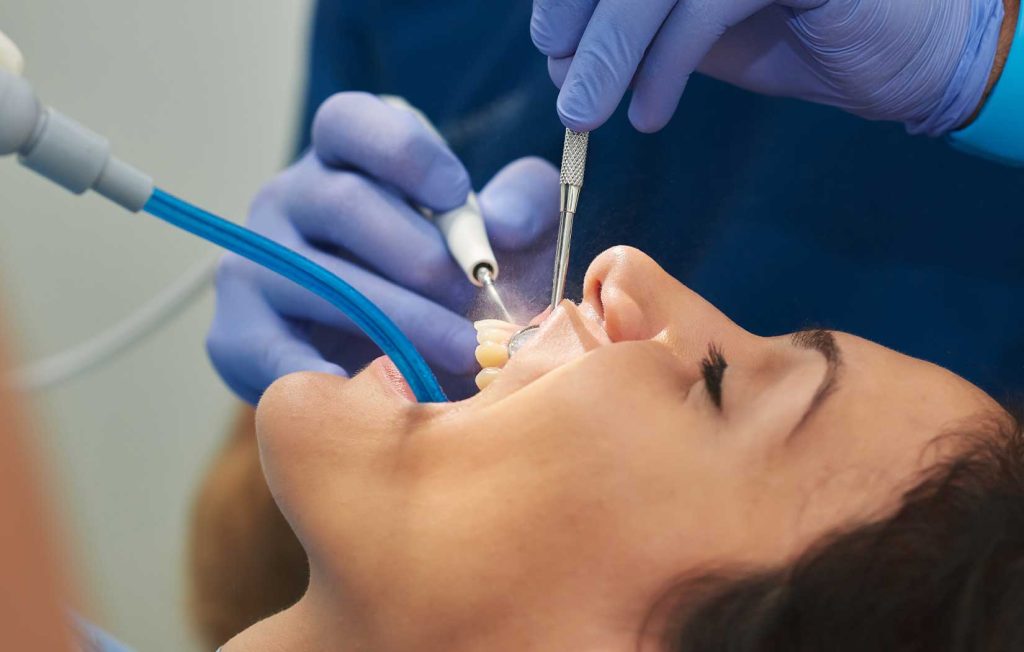 Patient Getting Teeth Cleaning